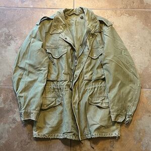 Vintage 1960s faded distressed Olive Green M-65 field jacket, good condition